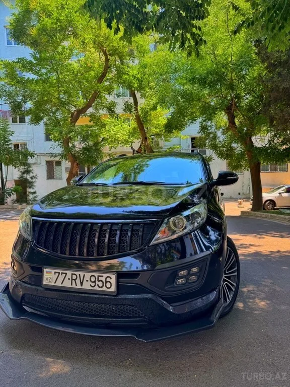 Kia Sportage — foto 4/4