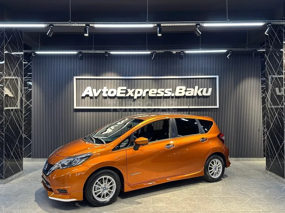 Nissan Note — фото 1/4