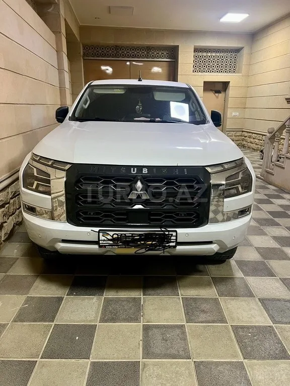 Mitsubishi L200 — фото 1/4