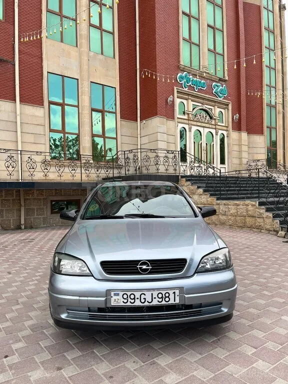 Opel Astra — фото 2/4