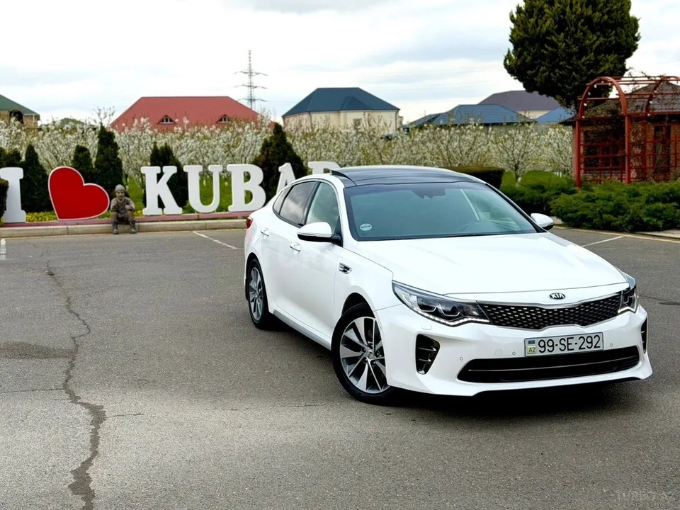 Kia Optima — фото 1/4