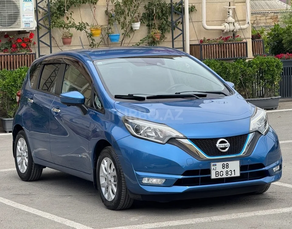 Nissan Note — фото 1/4
