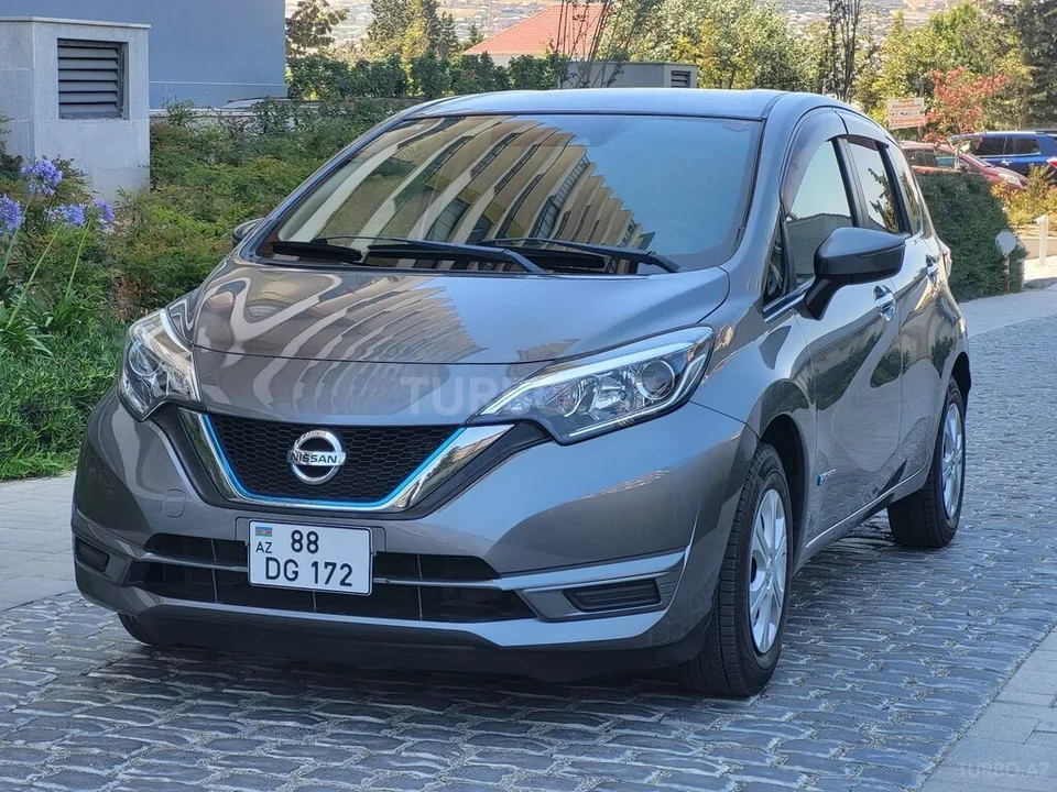 Nissan Note — фото 1/4