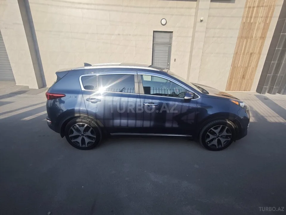 Kia Sportage — фото 3/4