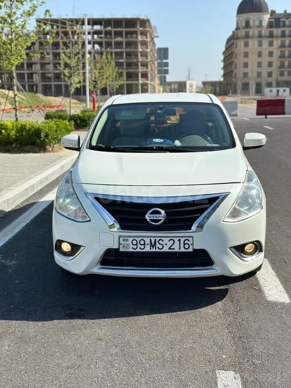 Nissan Sunny — фото 1/4