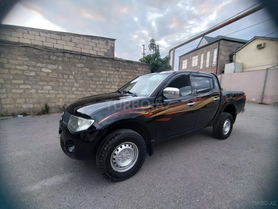 Mitsubishi L200 — фото 3/4