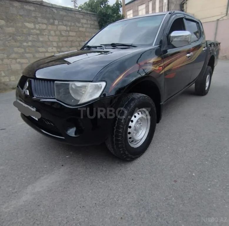 Mitsubishi L200 — фото 4/4