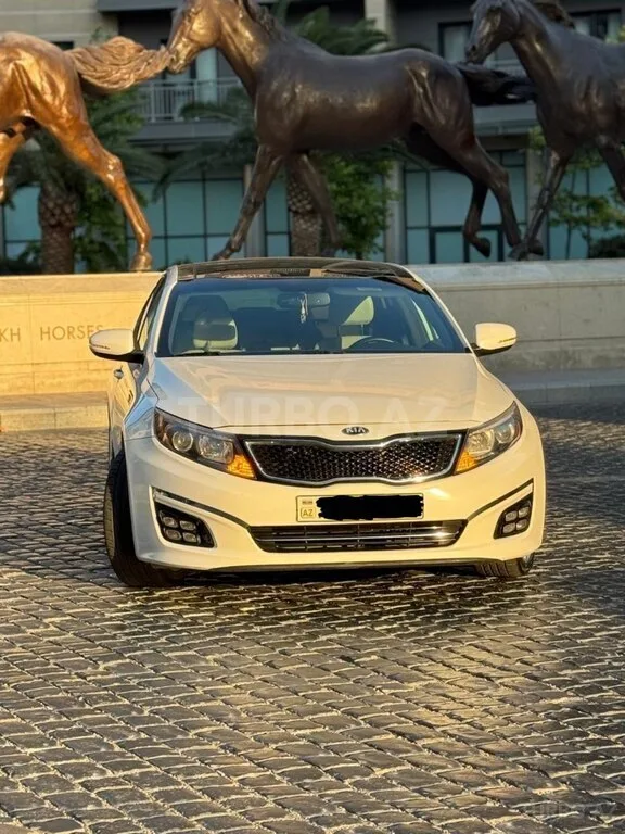 Kia Optima — фото 1/4