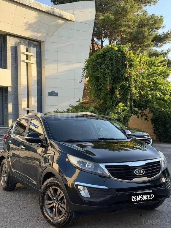 Kia Sportage — foto 1/4