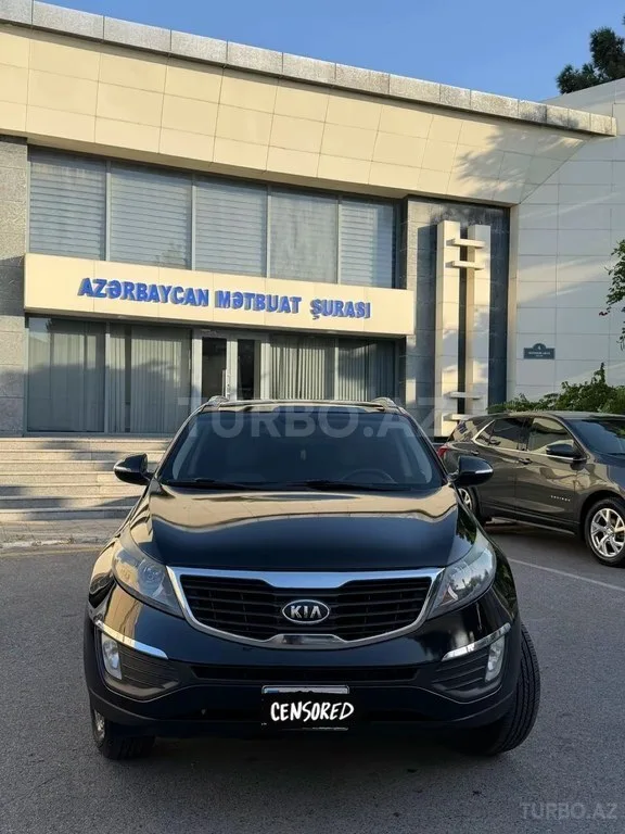 Kia Sportage — foto 2/4