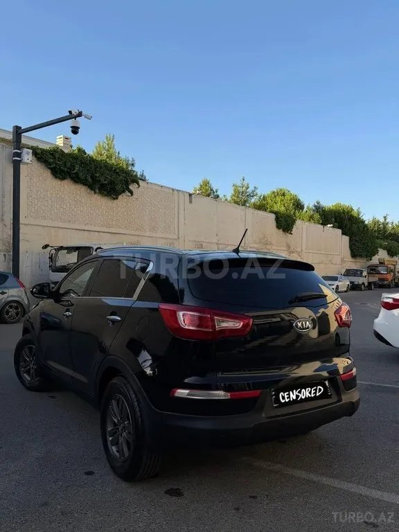Kia Sportage — foto 4/4