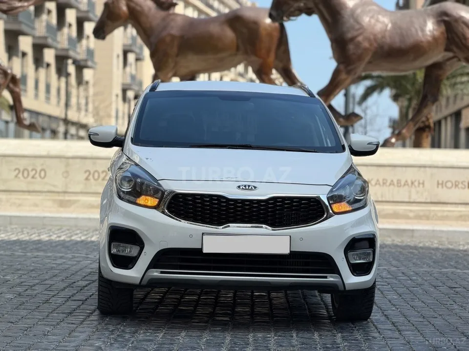 Kia Carens — фото 3/4
