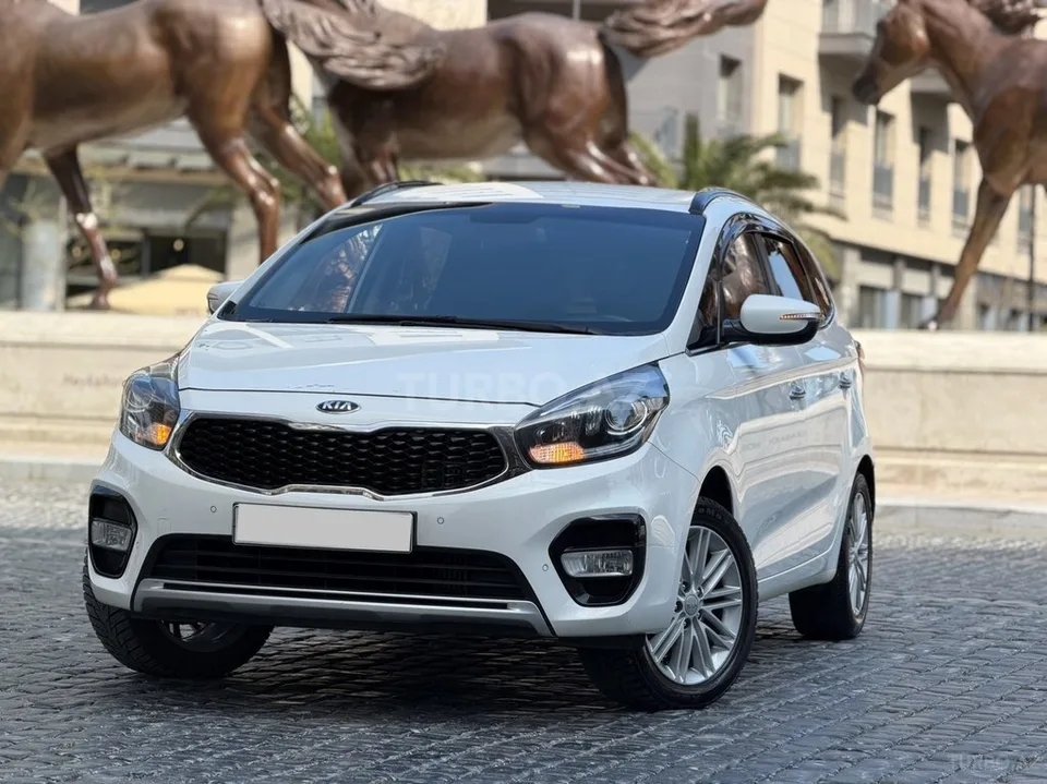 Kia Carens — фото 4/4