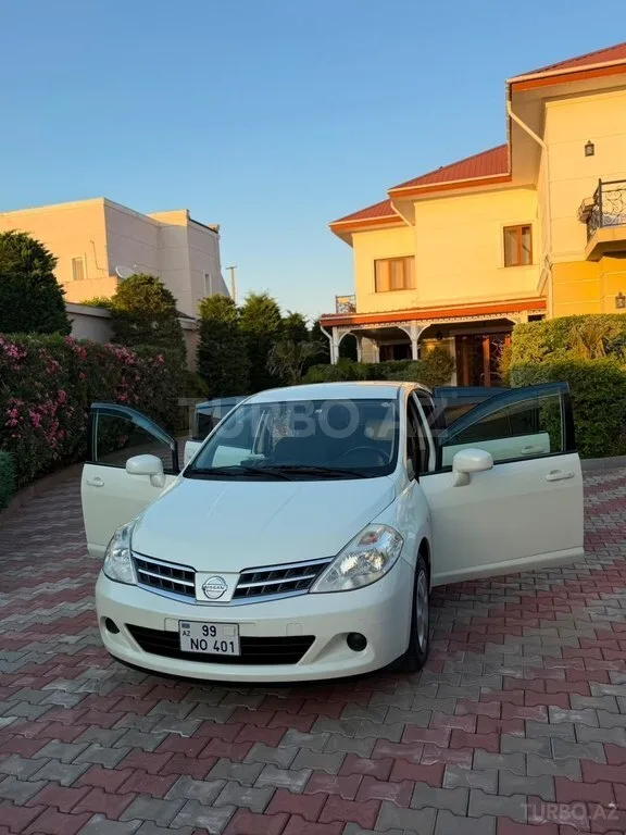 Nissan Tiida — фото 2/4