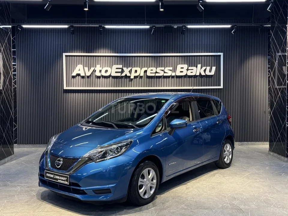 Nissan Note — фото 1/4