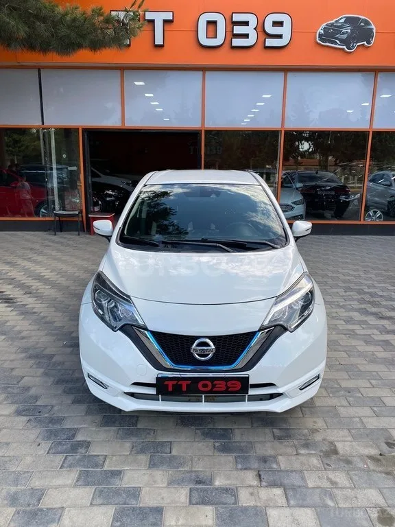 Nissan Note — фото 1/4