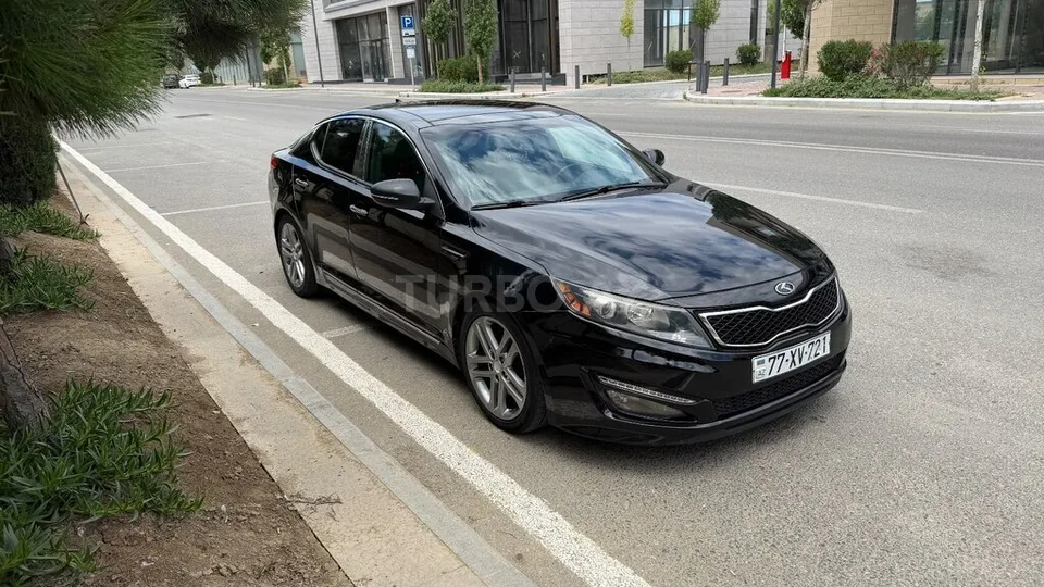 Kia Optima — фото 1/4