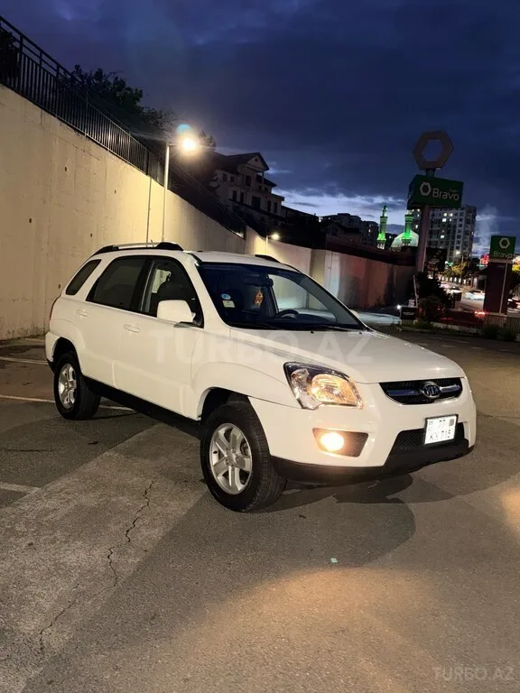 Kia Sportage — foto 4/4