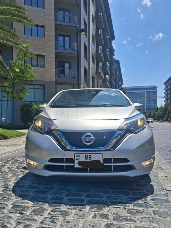 Nissan Note — фото 1/4