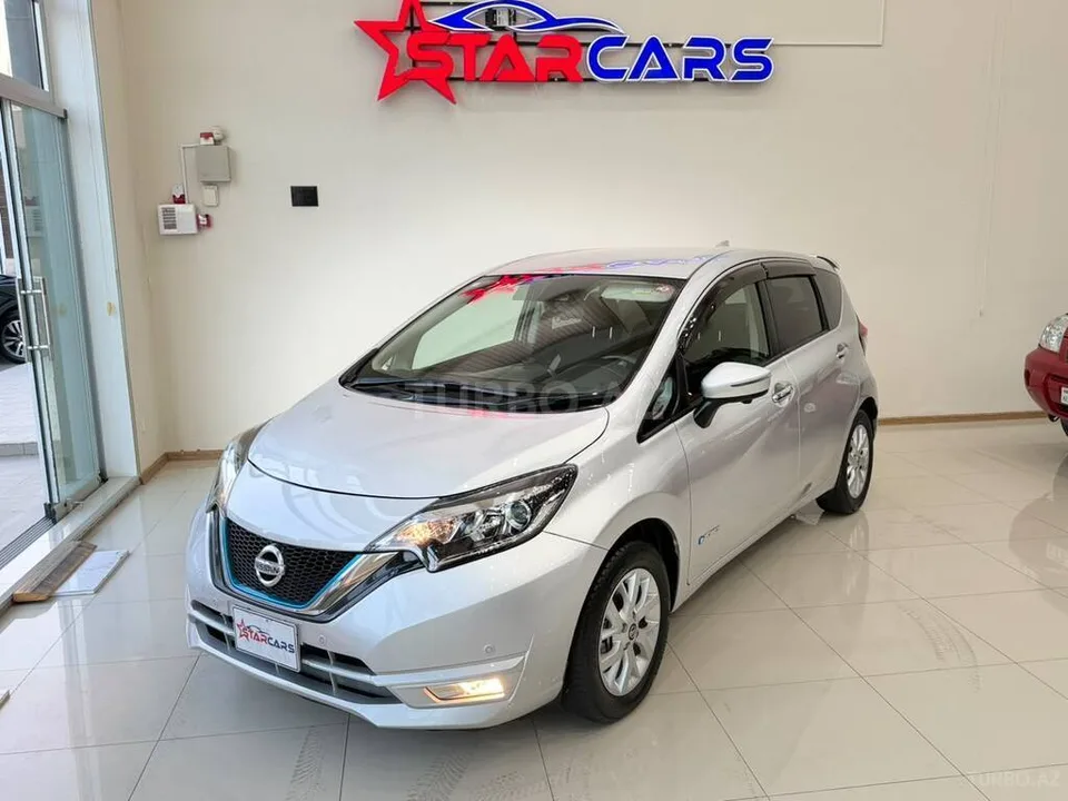 Nissan Note — фото 1/4
