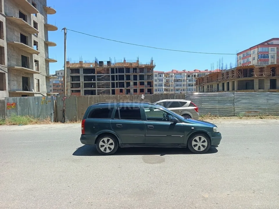 Opel Astra — фото 2/4