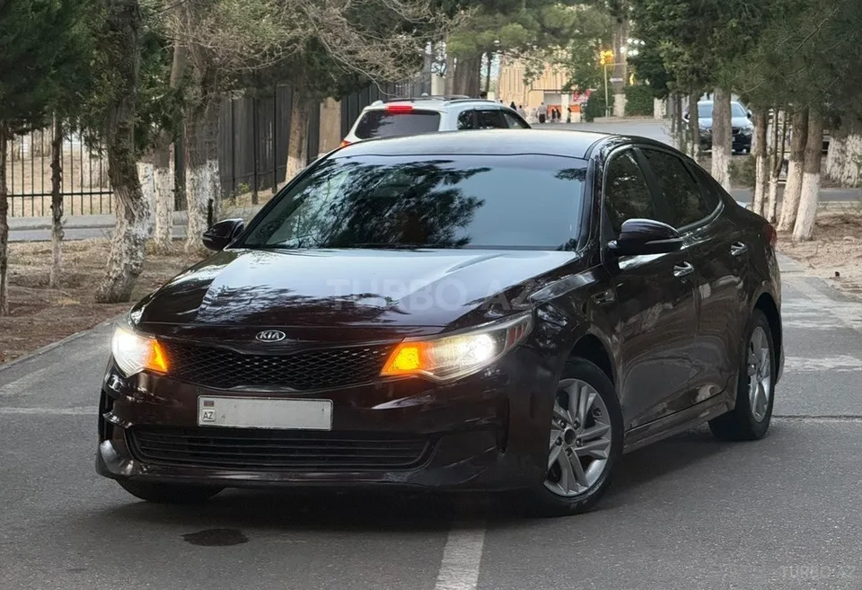 Kia Optima — foto 1/4