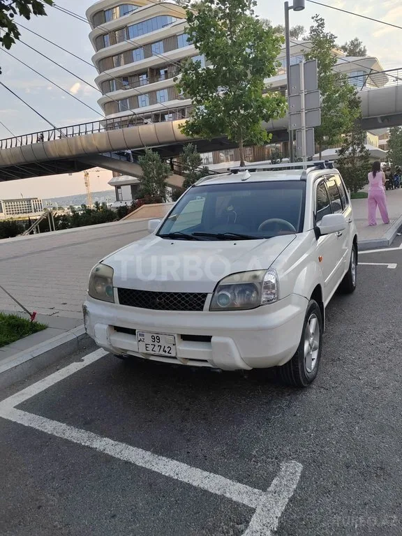 Nissan X-Trail — фото 1/4