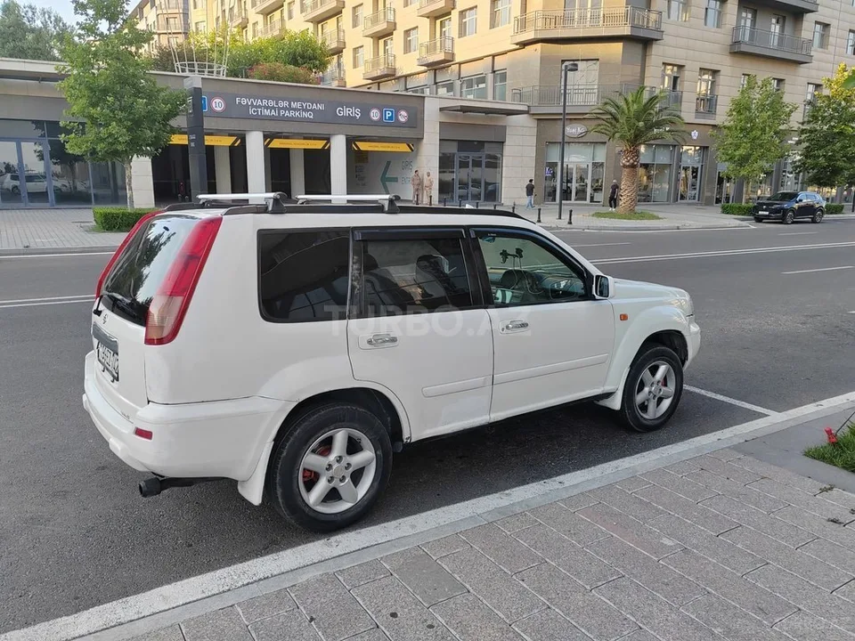 Nissan X-Trail — фото 3/4