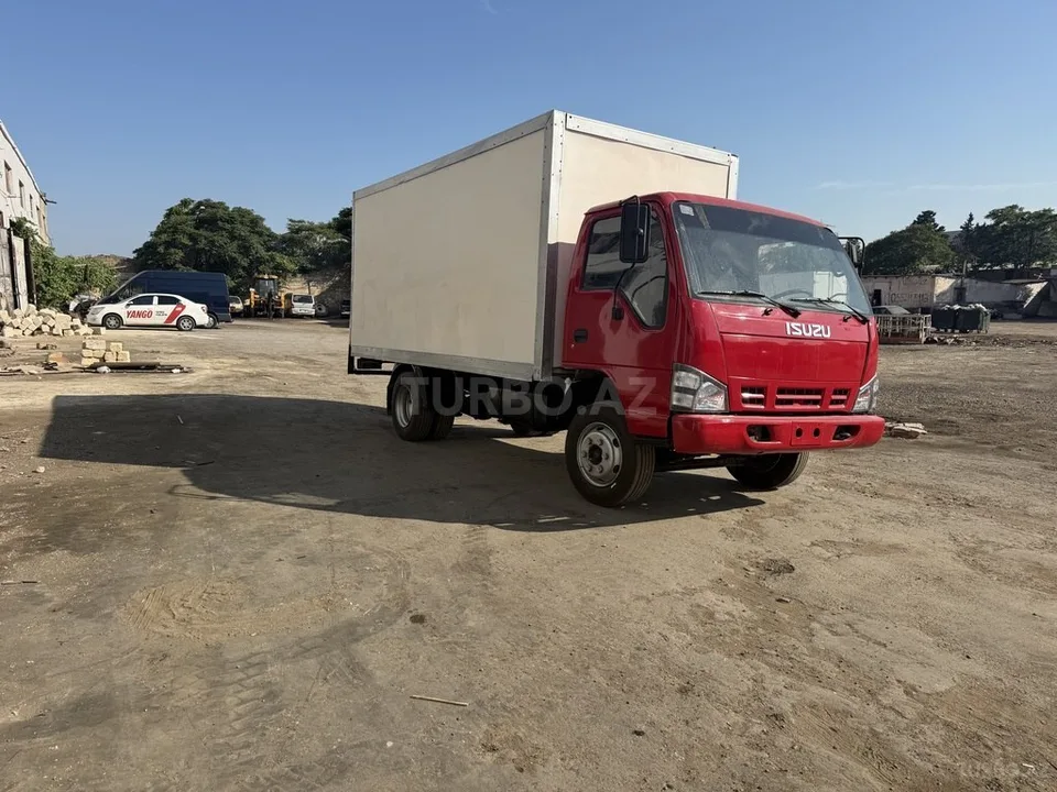 Isuzu NPR 66 L — фото 1/4