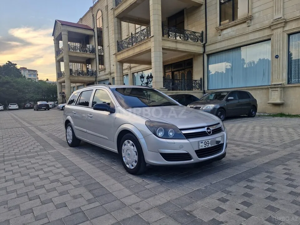 Opel Astra — фото 2/4
