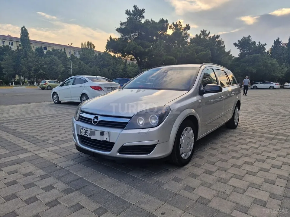 Opel Astra — фото 3/4