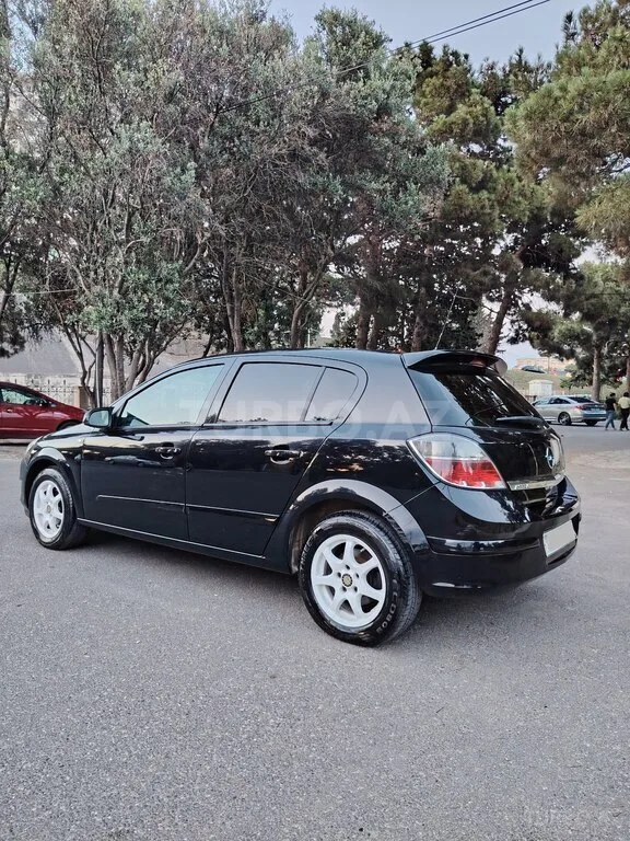 Opel Astra — фото 4/4