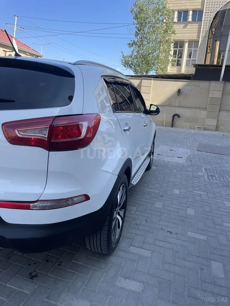 Kia Sportage — foto 4/4