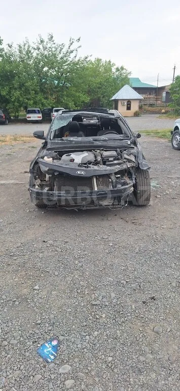 Kia Optima — фото 1/4