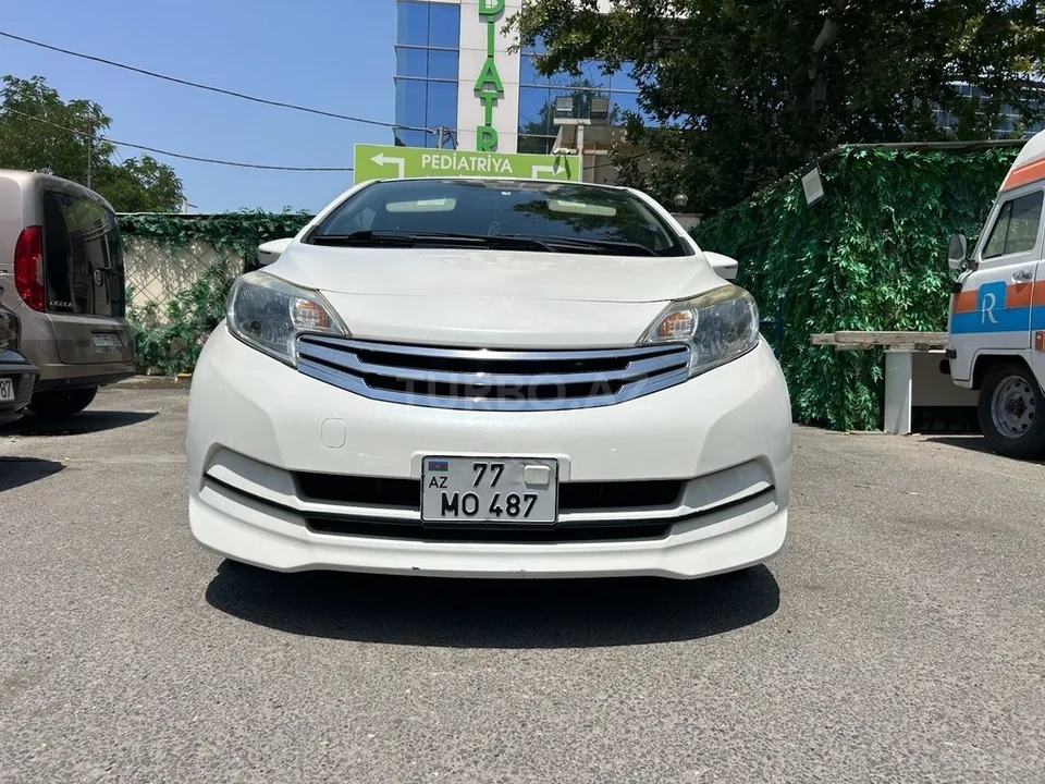 Nissan Note — фото 1/4
