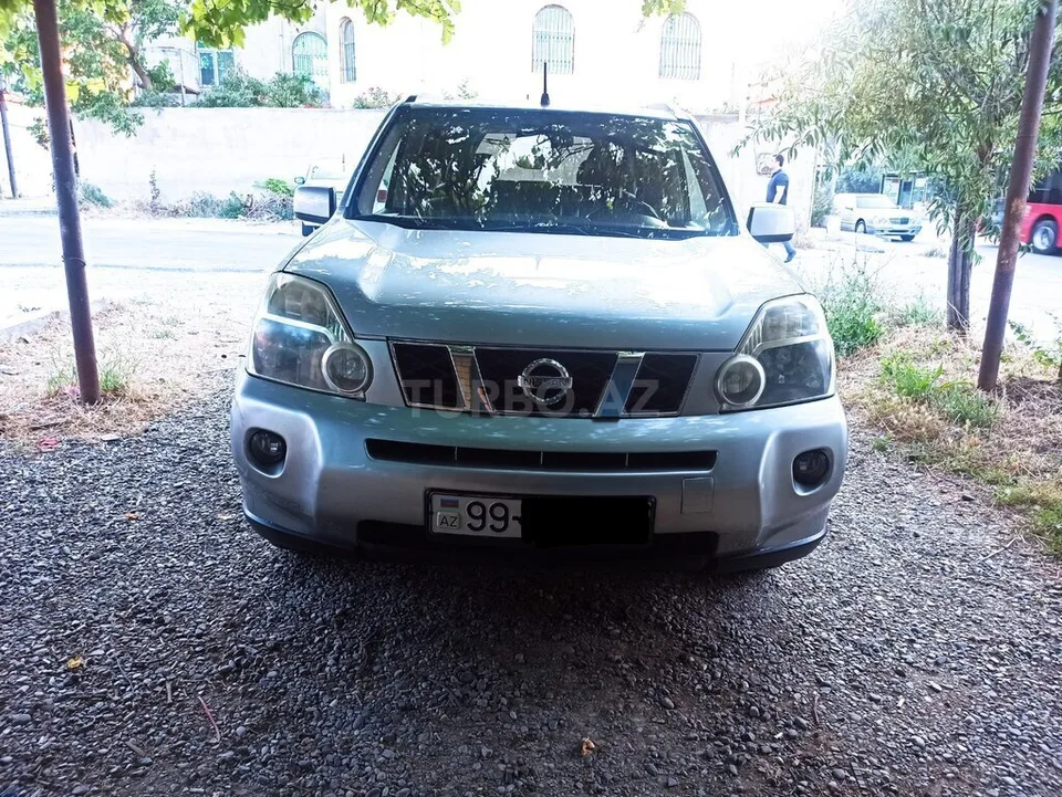 Nissan X-Trail — фото 1/4