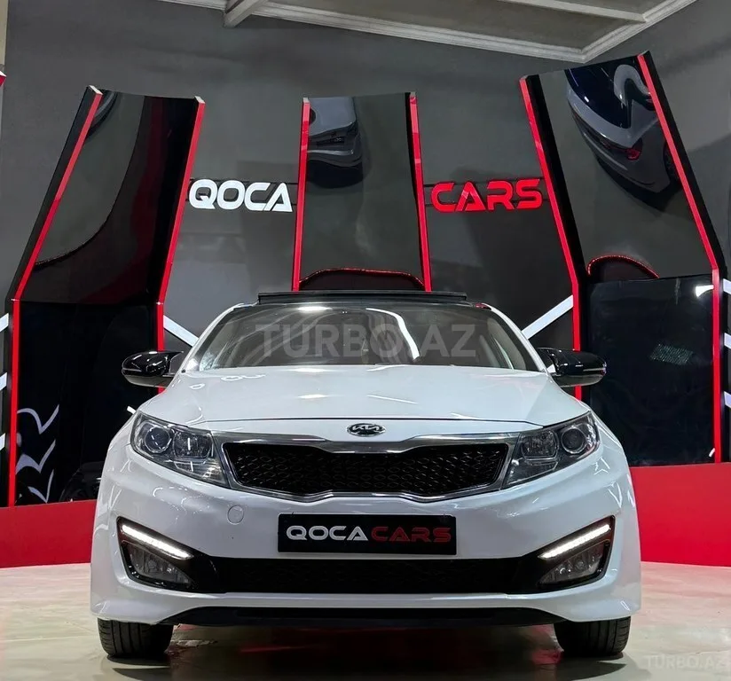 Kia Optima — фото 1/4