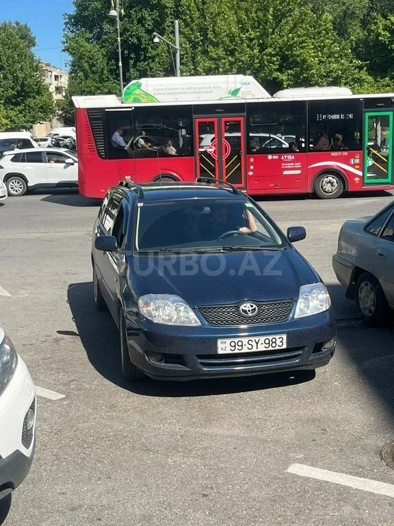 Toyota Corolla — foto 1/4