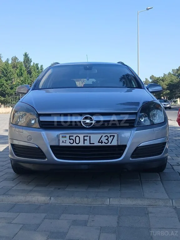 Opel Astra — фото 1/4
