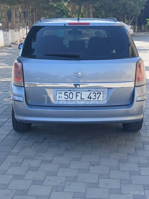 Opel Astra — фото 2/4