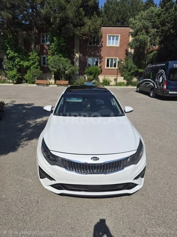 Kia Optima — фото 1/4