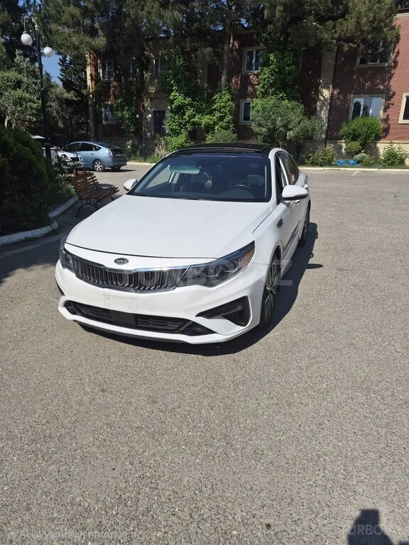 Kia Optima — фото 2/4