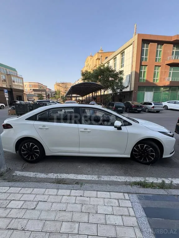 Toyota Corolla — foto 3/4