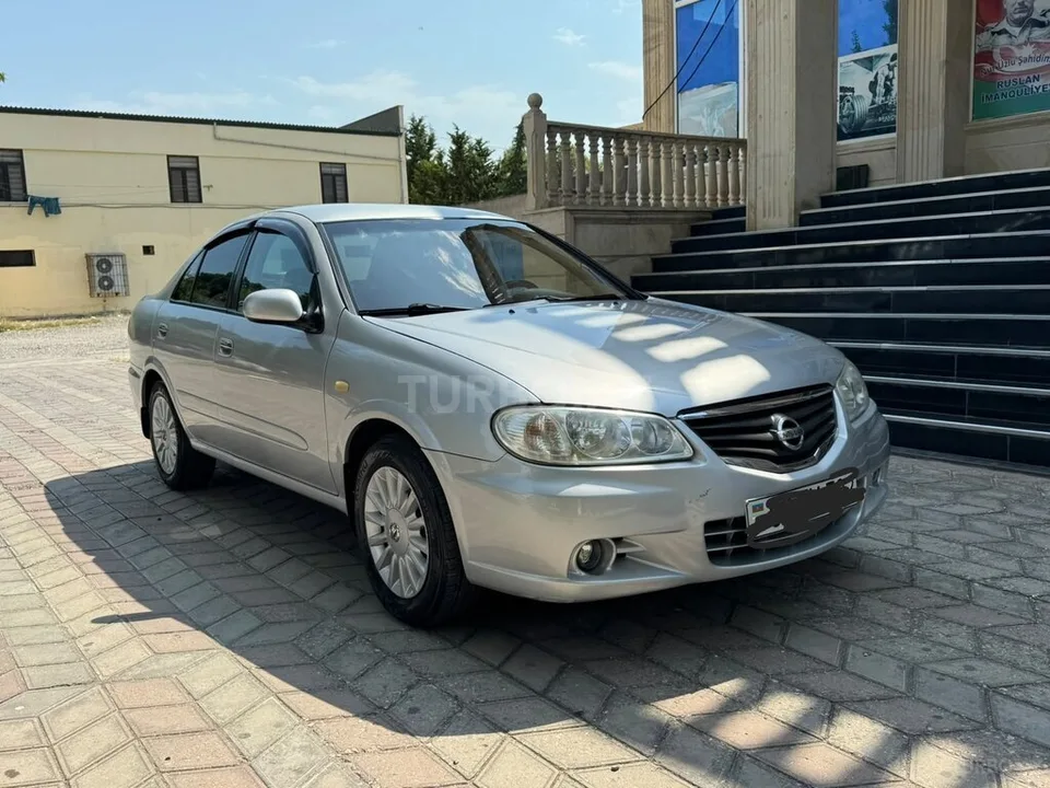 Nissan Sunny — фото 1/4