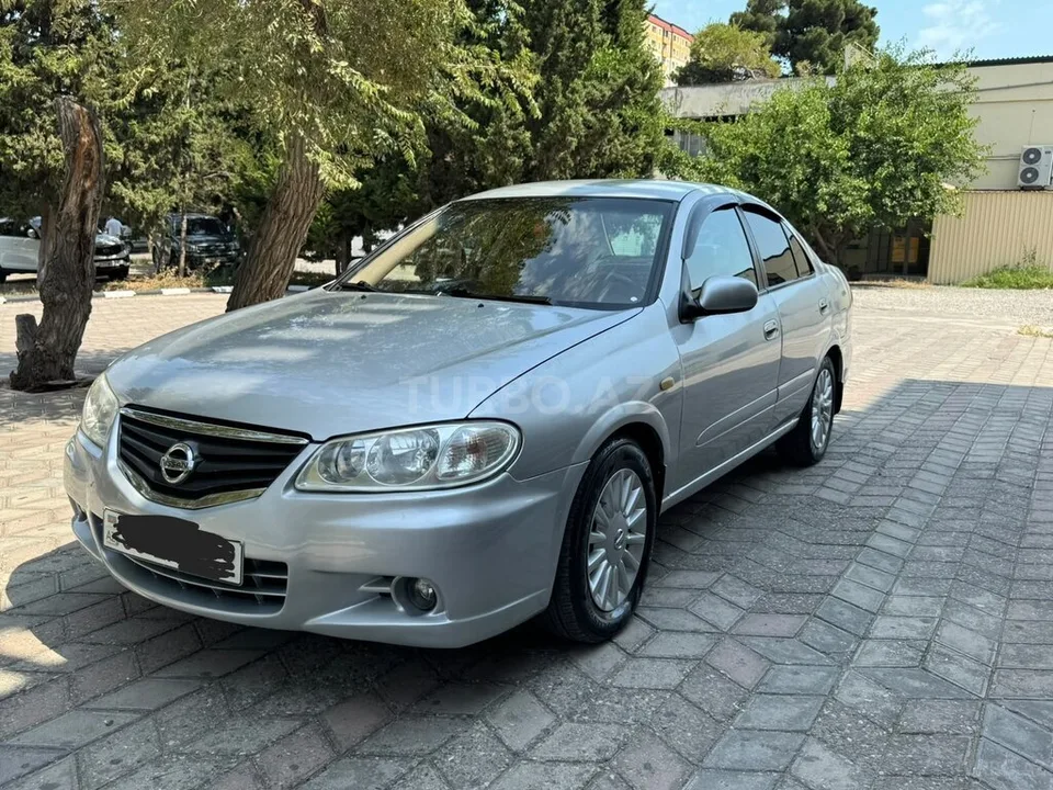 Nissan Sunny — фото 2/4