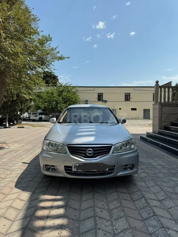 Nissan Sunny — фото 3/4