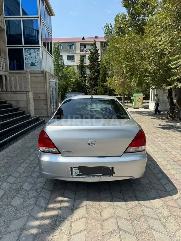 Nissan Sunny — фото 4/4