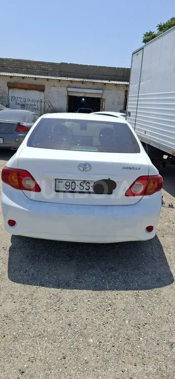 Toyota Corolla — foto 2/4