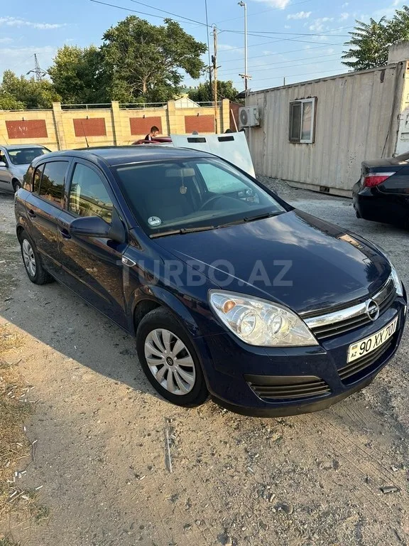 Opel Astra — фото 3/4