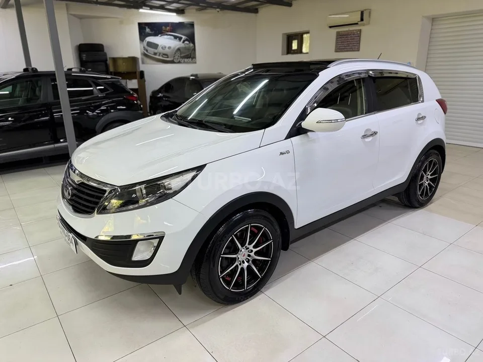 Kia Sportage — фото 4/4
